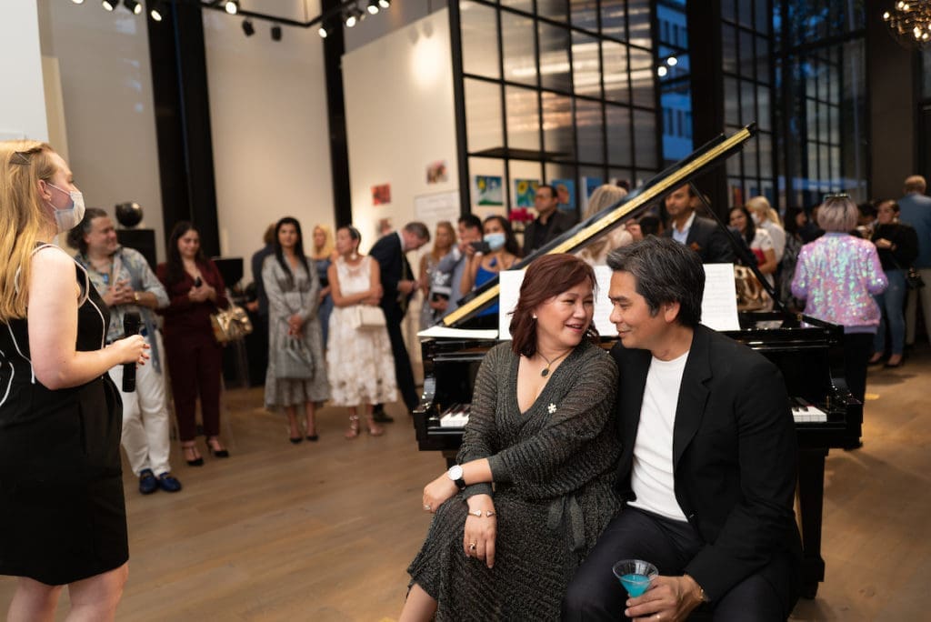 KNOWAutism founder Tammy Nguyen and husband Wayne Nguyen at the non-profit's inaugural art exhibition, held at River Oaks District.(Photo by Daniel Ortiz)