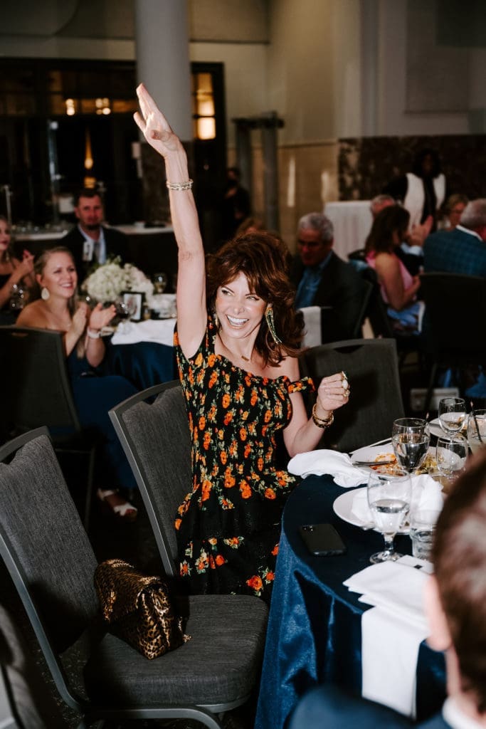 Marla Hurley in the spirit of giving at the HelpCureHD fundraiser (Photo by RaeTay Photography)