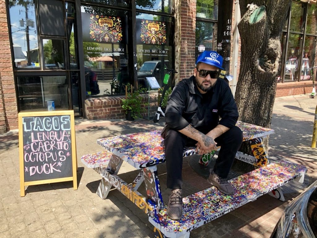 Regino Rojas in front of his Deep Ellum Revolver Taco Lounge moves on from Fort Worth.