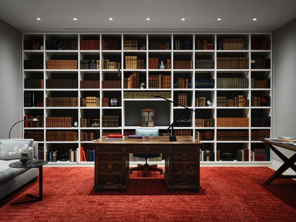 In the study, custom Marc Phillips rug. The antique desk belonged to the homeowner's father. Poliform side table, vintage Cedric Hartman floor lamp and Tizio task lamp. (Photo by Douglas Friedman)