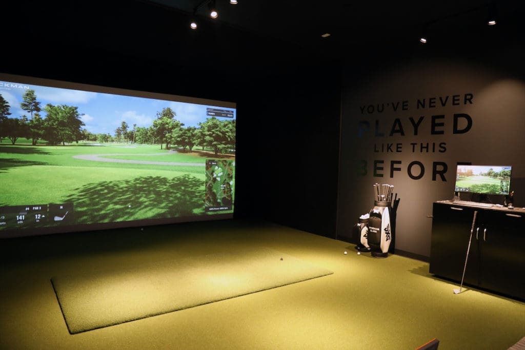 A simulation room within the PXG Dallas store features Trackman technology. (Photo by Rick Kern/Getty Images for PXG)