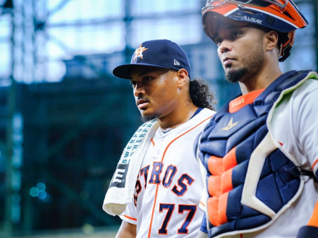 Luis Garcia and Martin Maldonado know all about going to work. (Photo by F. Carter Smith)