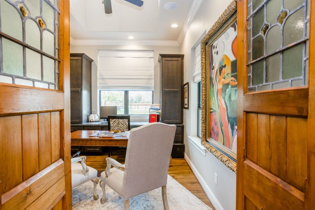 Working from home need not be a stultifying experience. Make your office an inviting space by adding color and personal touches, such as favorite art.