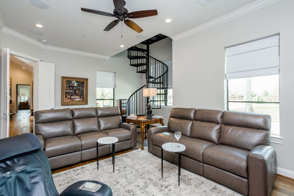 Room with specific purposes, such as this screening and media room, must have suitable seating.