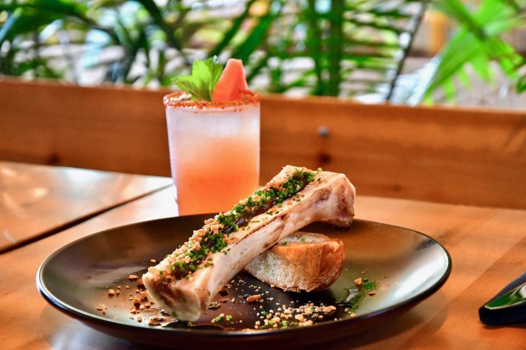 The chef's bone marrow dish ($19) is a guajillo marmalade-topped bone marrow app.  (Photo by Michael Anthony)