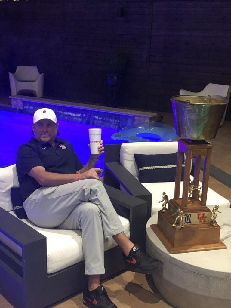 UH coach Dana Holgorsen seems to be enjoying his time with the Bayou Bucket trophy. (@Holgorsendana) 