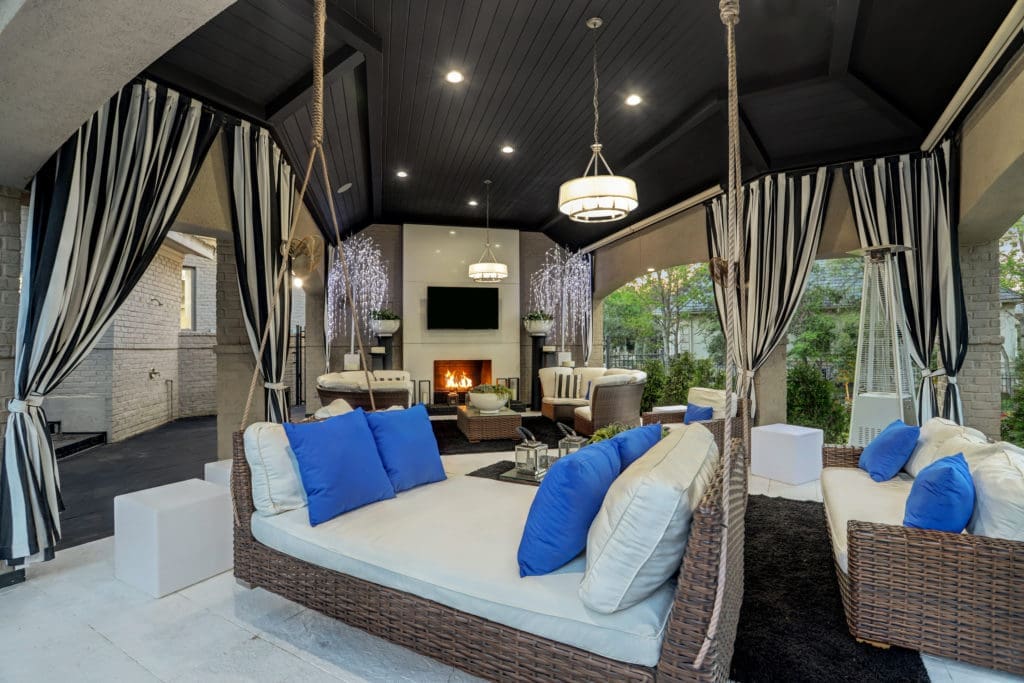The swank 17,380 square foot mansion in The Woodlands was built for entertaining indoors and out.