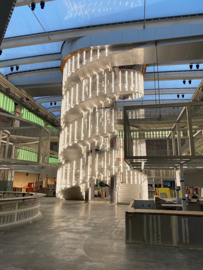 The Vladimir Tatlin-inspired staircase that anchors the 53,000 square foot food hall at POST Houston. (Photo by Shelby Hodge)