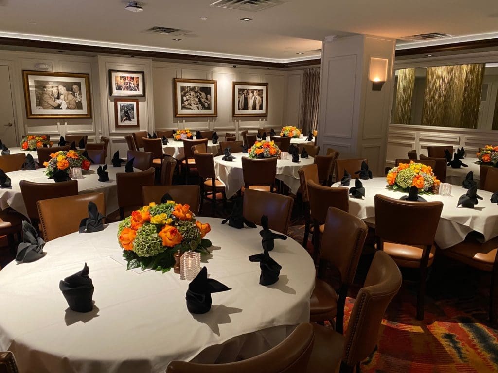 Dining tables in the new Palm Restaurant in downtown Houston, Tilman Fertitta's latest addition to his plethora of downtown steak houses. (Photo by Shelby Hodge)