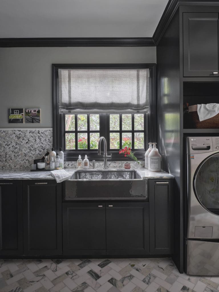 A chic laundry room by Kathleen Walsh Interiors (Photo by Stephen Karlisch)