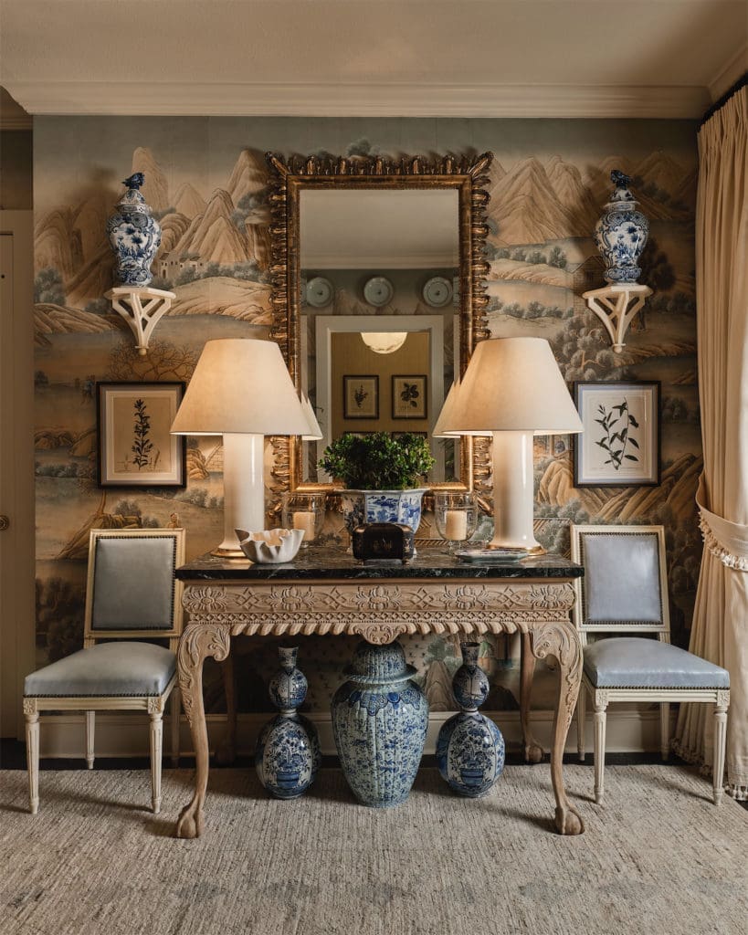 A hallway and powder bath by Caroline Gidiere Design LLC (Photo by Stephen Karlisch)