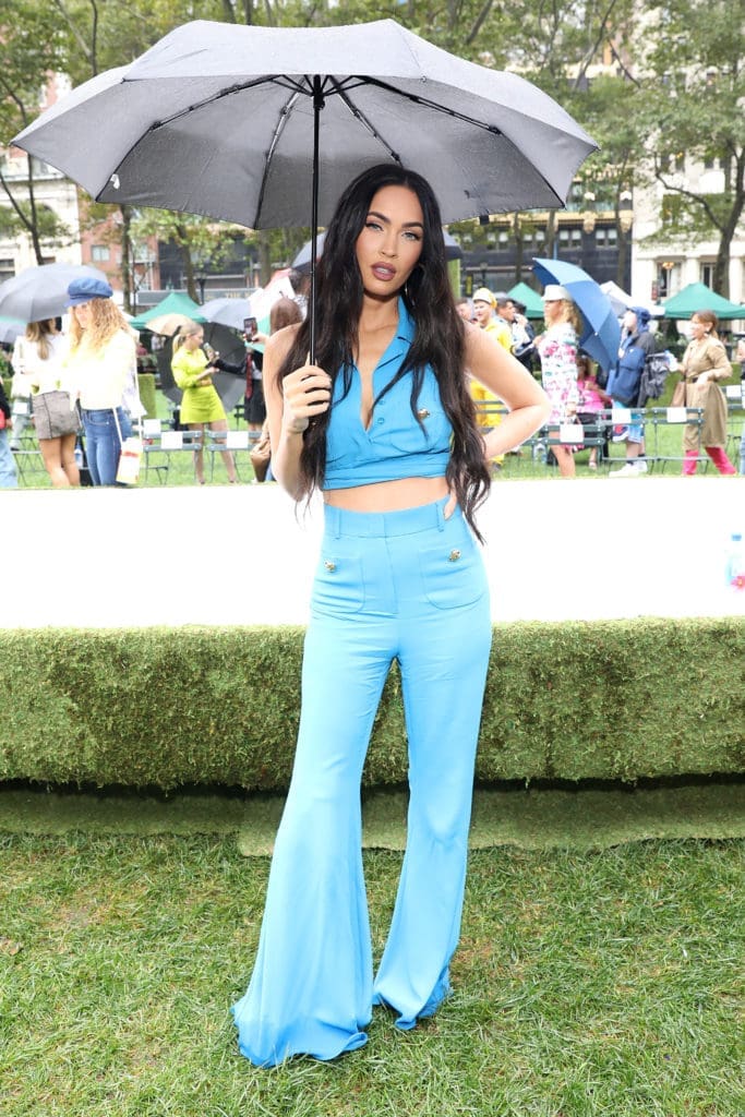 Megan Fox was among the celebrities attending the Moschino runway show in the rain (Photo by Monica Schipper/Getty Images  for Moschino))