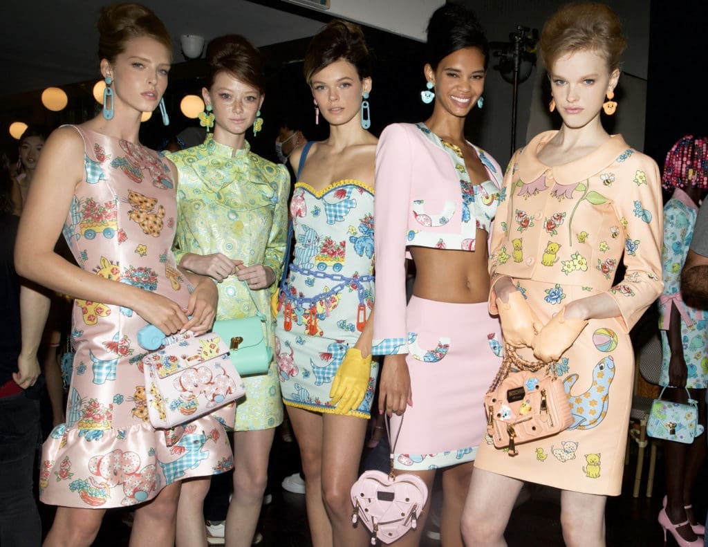 Rainy Runway, Bright Clothes and A-List Celebs — Moschino’s Risky Outdoor Show is a Soggy Delight