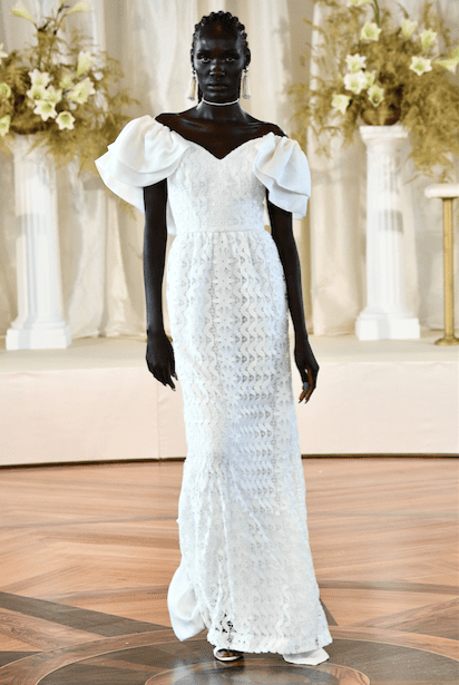 Markarian Roxie white lace off the shoulder gown with satin faced organza detailing. (Photo courtesy of Markarian)