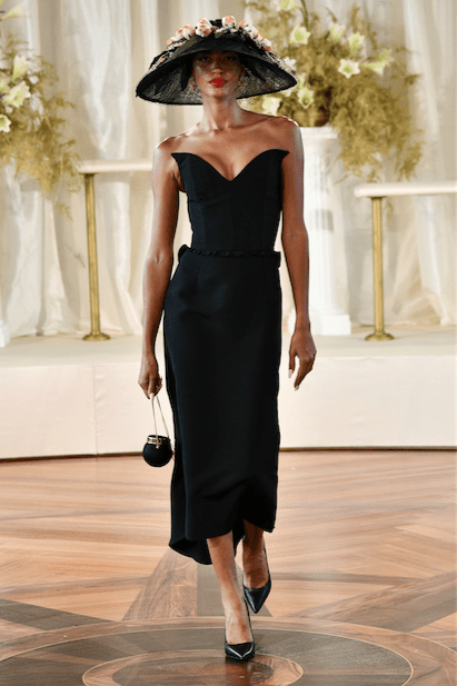 Markarian Lottie black silk faille strapless dress with back ruffle and hat by Gigi Burris Millinery. (Photo courtesy of Markarain)