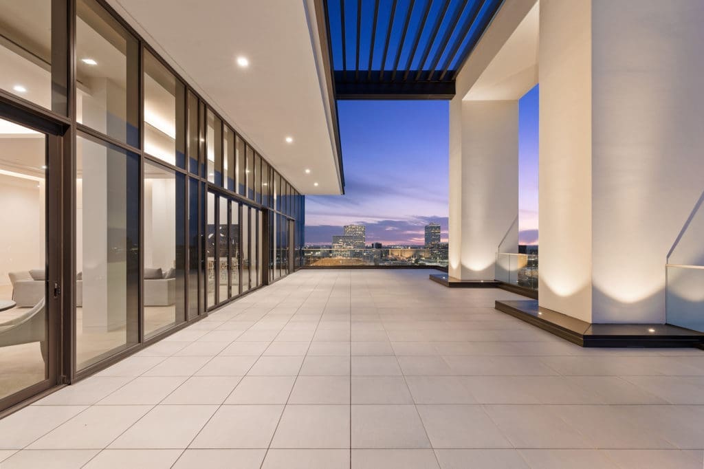 The 19th floor penthouse at The River Oaks is unique in Houston for its 2,200 square foot terrace and interior design by Rottet Studio. 