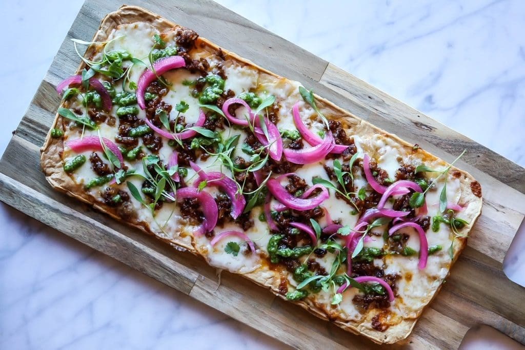 Definitely try the chorizo flatbread on Ascension's new evening menu.