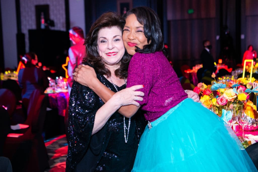Houston Children's Charity CEO Laura Ward and gala emcee Gina Gaston Elie at The Post Oak Hotel with special guest, Cyndi Lauper. (Photo by Michelle Watson, CatchlightGroup.com)