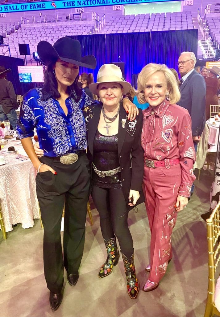 Board Member Nicole Sheridan, Designer Vera Vasiley, and Board Member Elaine Agather at the 45th National Cowgirl Museum and Hall of Fame Induction Luncheon in Fort Worth, Texas