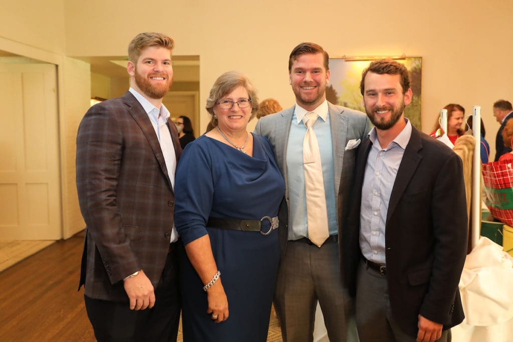Peter Brueggeman, Elizabeth Brueggeman, Eric Brueggeman, Hunter Comiskey at the Heritage Society's Houston Heritage Luncheon (Photo by Priscilla Dickson)