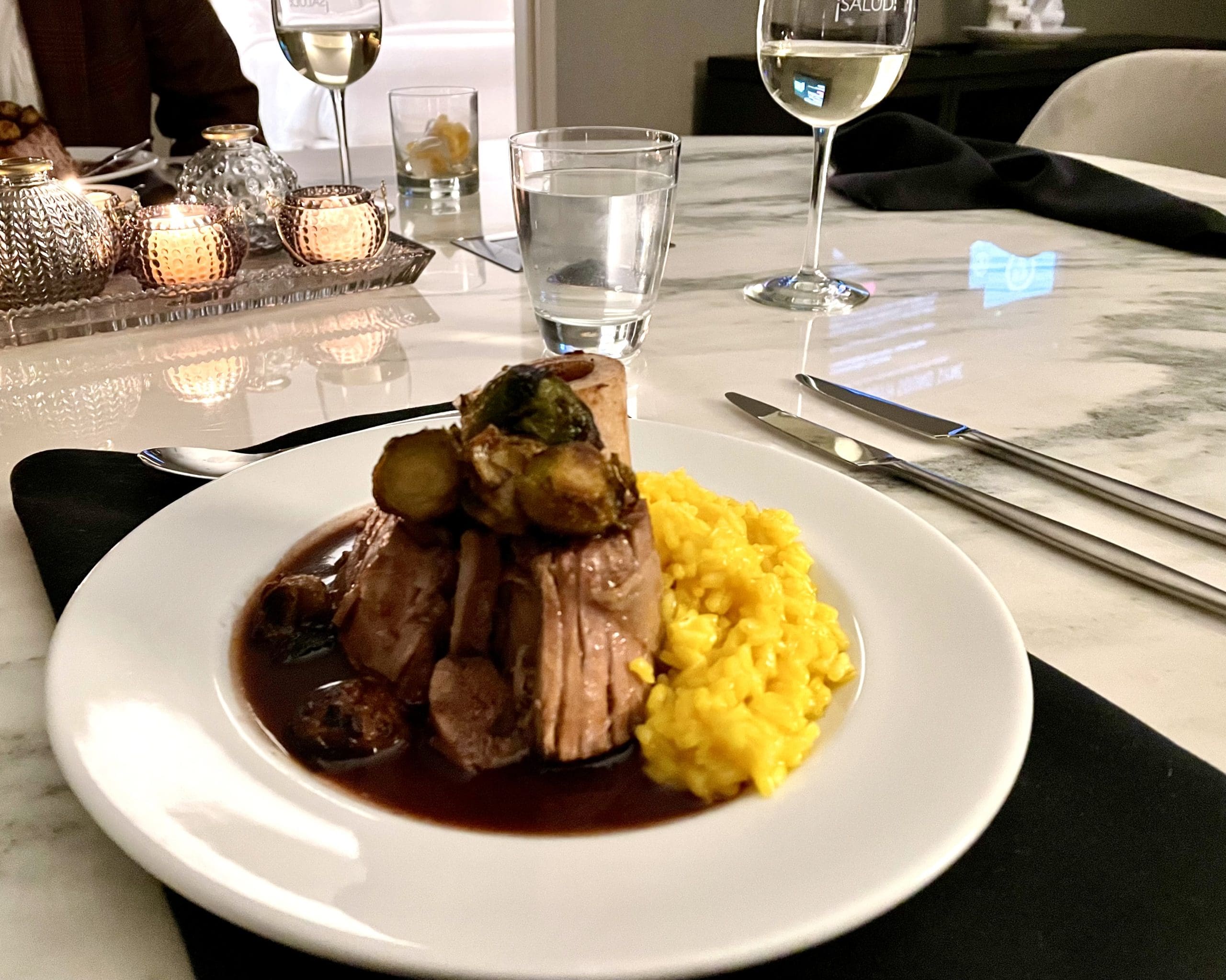 Osso bucco with saffron risotto, prepared by new chef Javier Maysonnet. (Photo by Courtney Dabney)