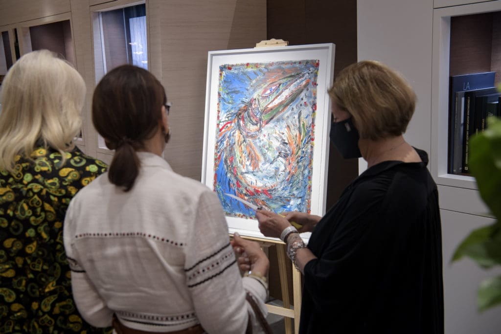 Admiring a painting at Audemars Piguet  (Photo by Bruno, Snap the Picture)
