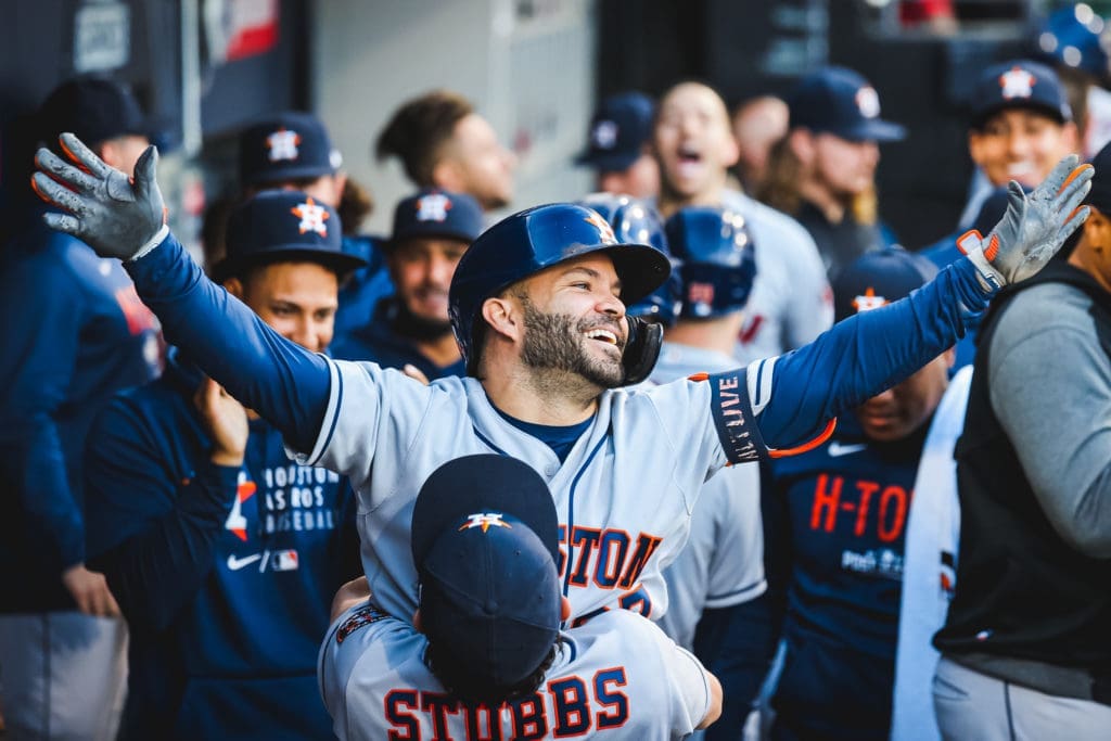 Jose Altuve hit a three run bomb in the ninth to seal it. And then got lifted in the air by backup catcher Garrett Stubbs during the dugout celebration. (@Astros)