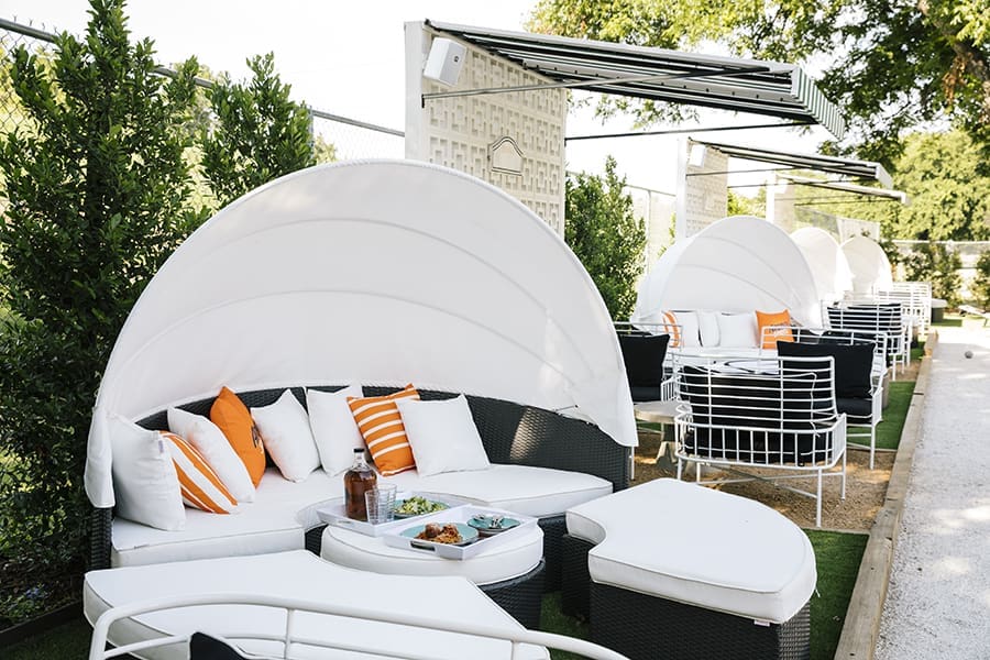 Gemelle's private cabanas near the bocce courts and the seasonal garden.