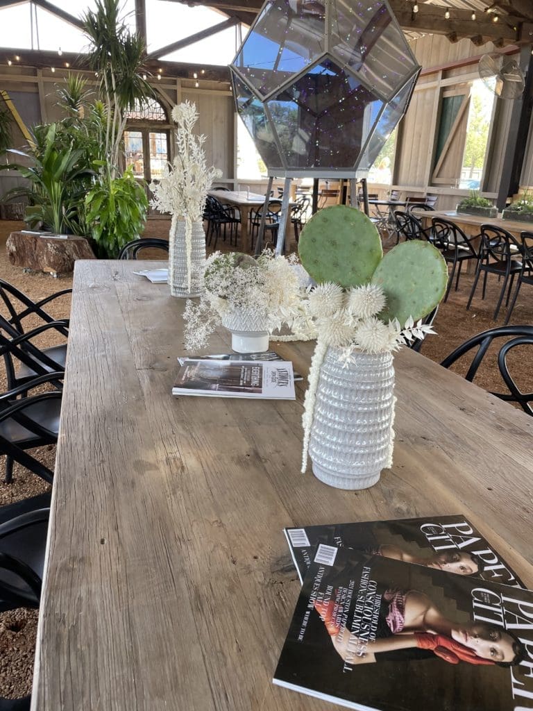 Tables for meeting and snacking are available for VIP Experience guests throughout The Halles during the Round Top Antiques Show.