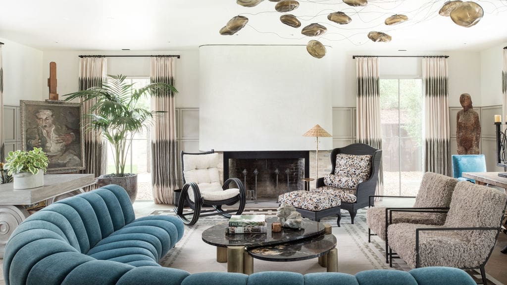 A sweeping staircase is the highlight of the Oak Creek home. (Photo by Tobin Davies Photography)