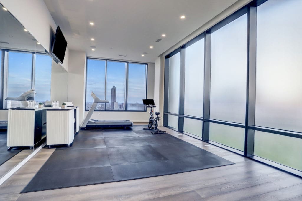 The exercise room in The Astoria penthouse, at 9,500 square feet it is on the market for $7,999,999 with Nancy Almodovar, founder of Nan and Company Properties. (Photo by TK Images)