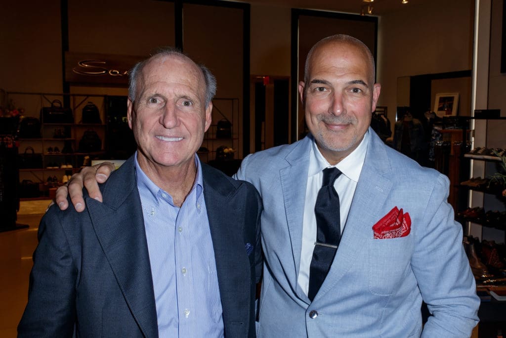 Crawford Brock (Stanley Korshak) and Tony Camarata (Santoni) celebrate the partnership of Stanley Korshak and Santoni in Dallas.