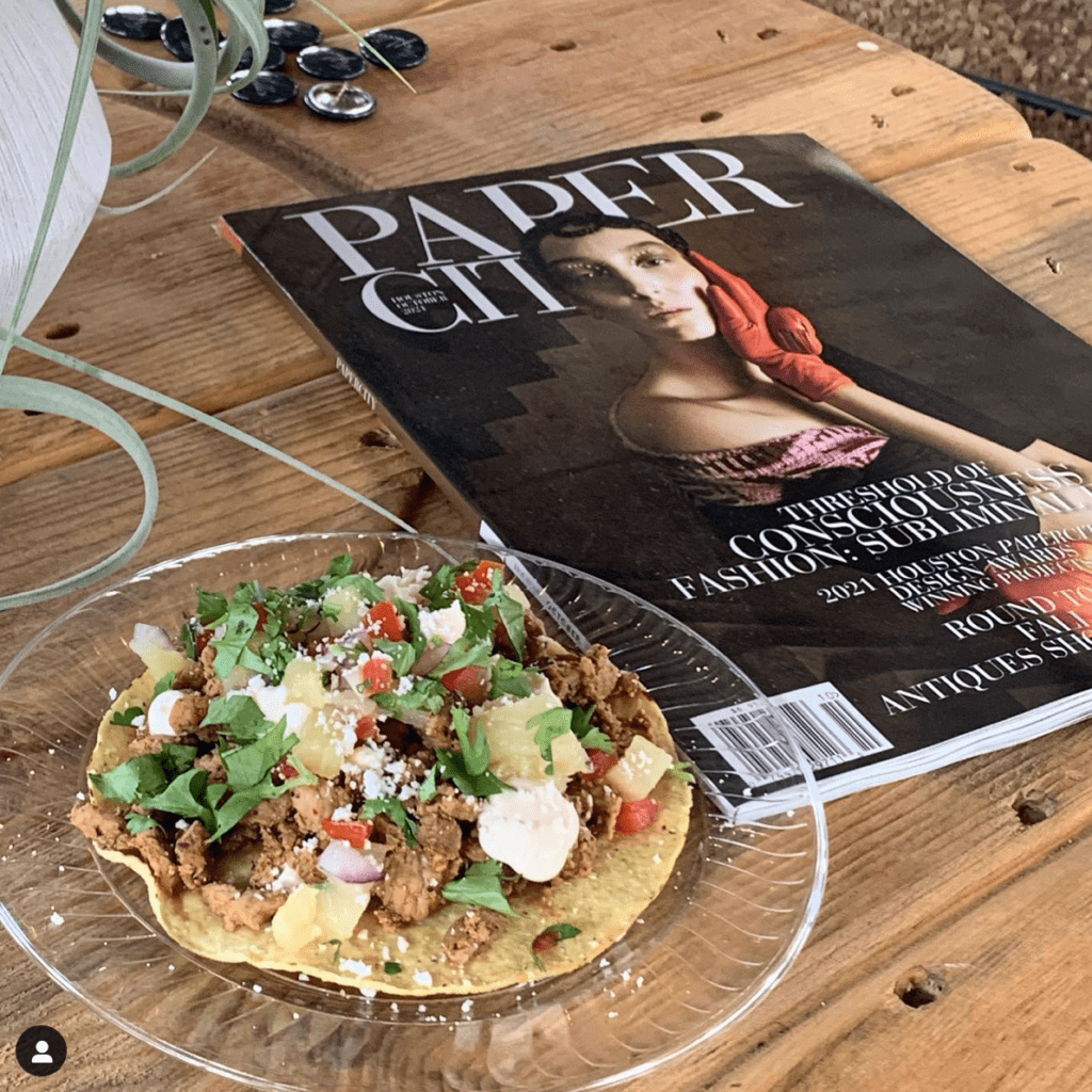 Al pastor tostada with pineapple salsa, crema and cilantro from the Blind Fox's food truck based at The Halles in Round Top.