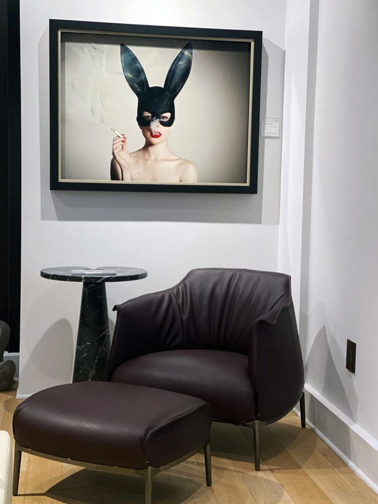 Tyler Shields and JD Miller's edgy Masterpiece collaboration converses with a Poltrona Frau Archibald chair at CASA Houston.