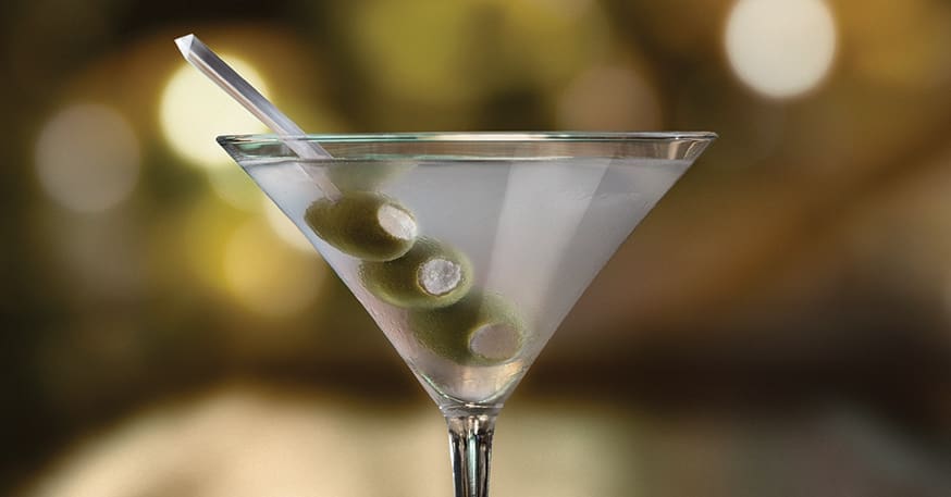 The Dapper Martini at Eddie V's is garnished with three skewered blue cheese stuffed olives.