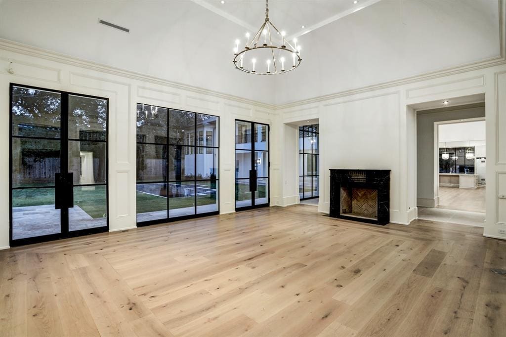 The formal living room at 3001 Inverness features a 17 foot vaulted ceiling. (Photo by TK Images)
