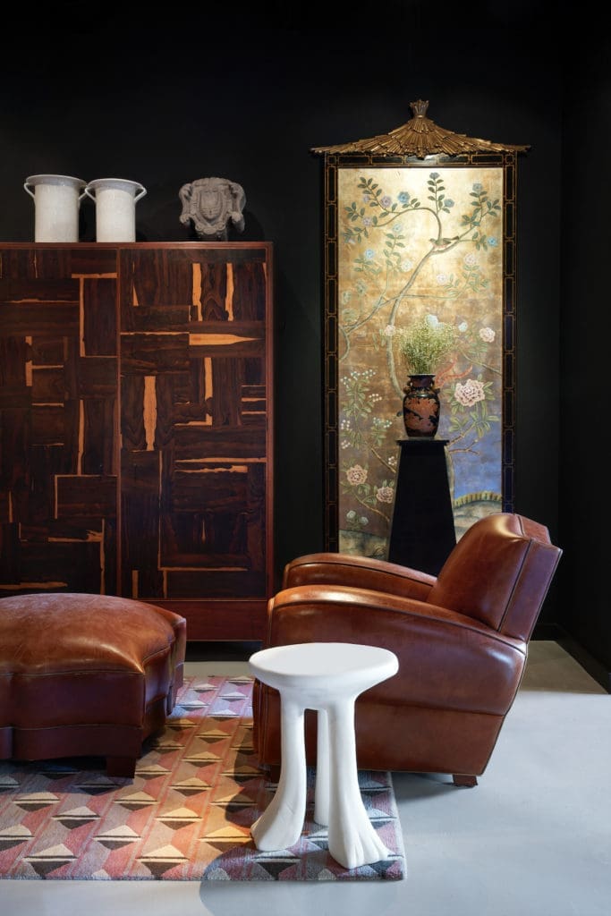 Vintage club chair and ottoman. Rug from The Rug Company. Custom cabinet D.H. Phillips. Dessin Fournir chinoiserie panel. John Dickinson side table from David Sutherland Showroom. (Photo by Pär Bengtsson)