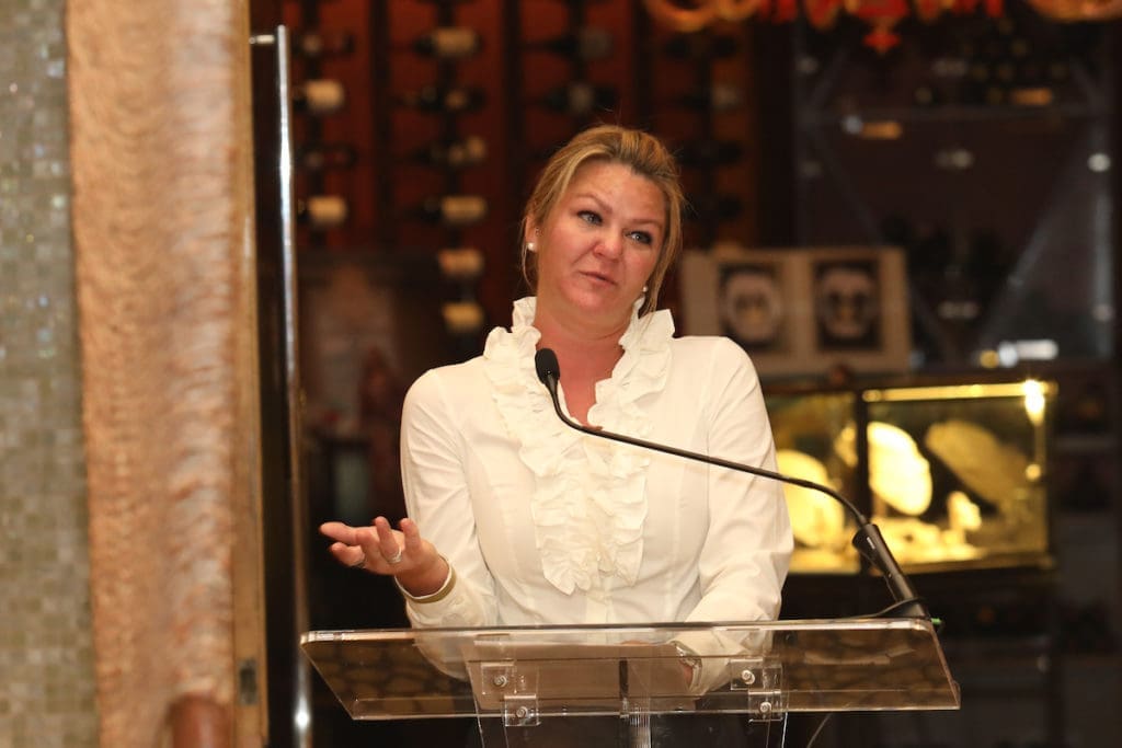 Lindsay Garcia gives a testimonial onChildren's Memorial Hermann Hospital and the March of Dimes at the Best Dressed luncheon, held at Tony's. (Photo by Priscilla Dickson)