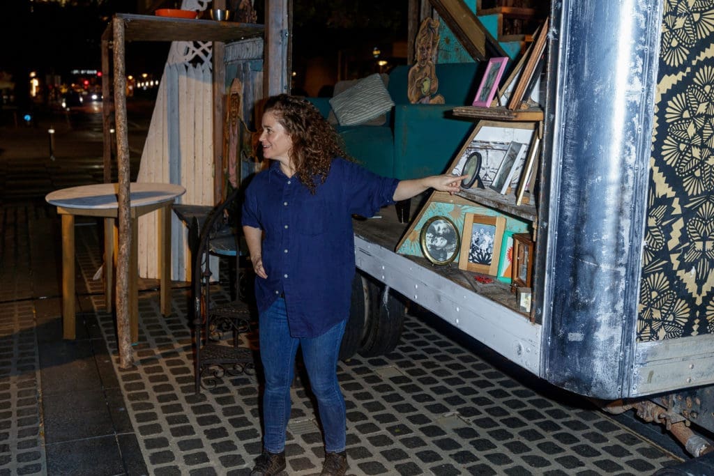 Caledonia Curry (a.k.a. SWOON) with her work (Photography by William Neal).   (Photo by William Neal)