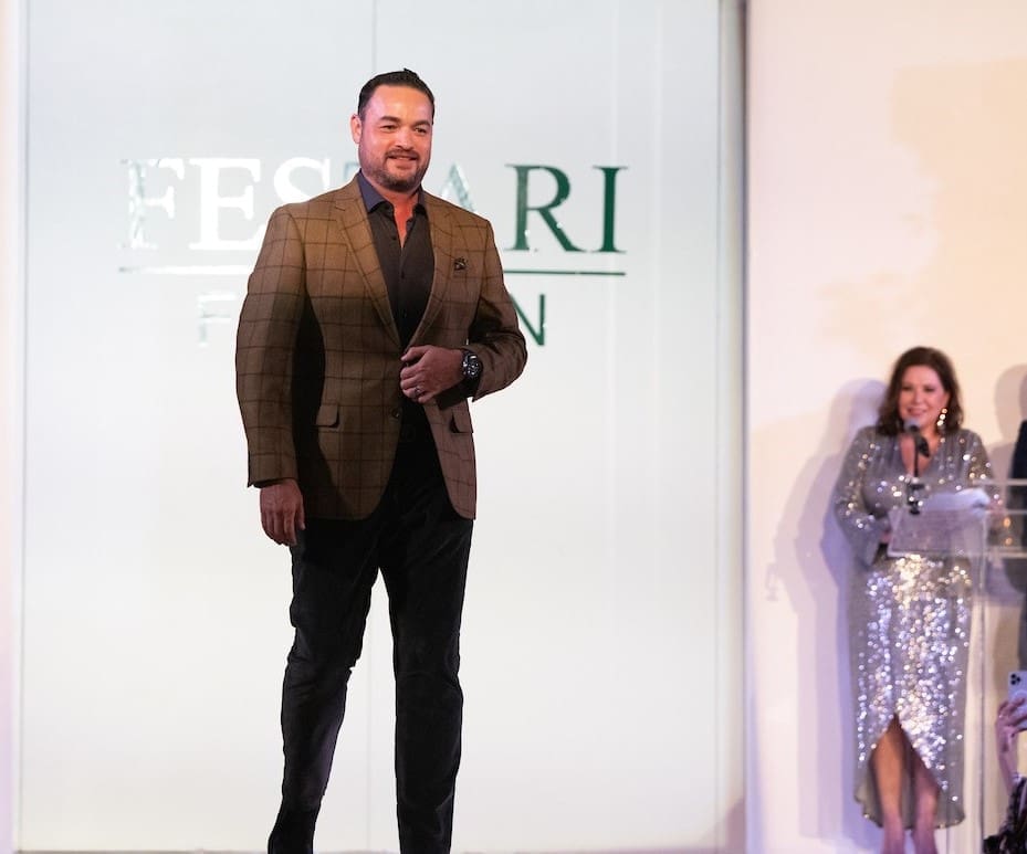 Hugo Guerrero walking the runway at Una Notte in Italia (Photo by Daniel Ortiz)