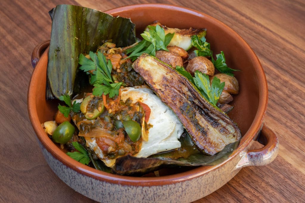 The Market Fish Veracruz at La Mina is cooked in banana leaf.