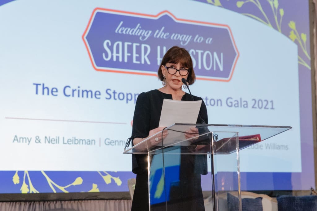 PaperCity Social & Lifestyle Editor Shelby Hodge serving as emcee at the Crime Stoppers of Houston gala. (Photo by CatchlightGroup.com)