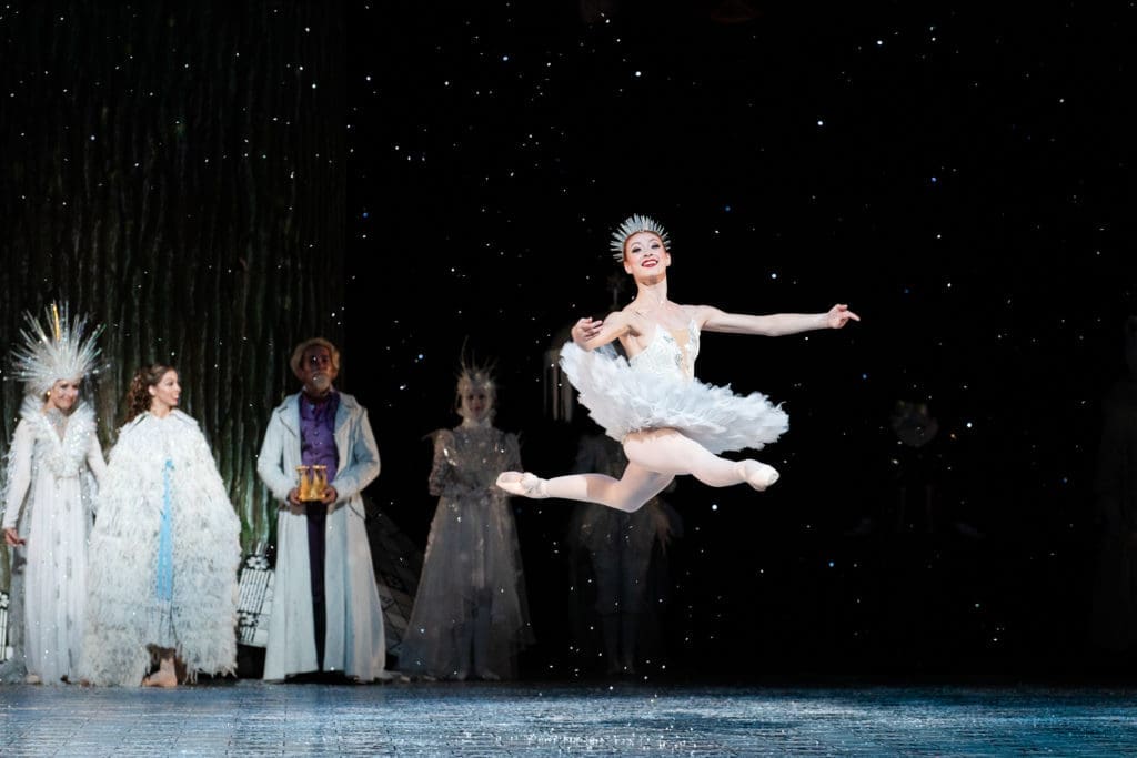 Houston Ballet Soloist Alyssa Springer  with artists of Houston Ballet on opening night 2021 of Stanton Welch’s The Nutcracker. (Photo by Lawrence Elizabeth Knox,  Courtesy of Houston Ballet)

