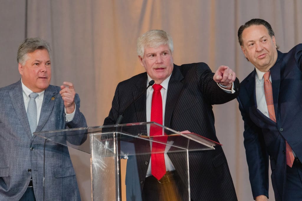 Paddles up with gala chairs Neil Leibman, John Eddie Williams, John McIntyre at the Crime Stoppers of Houston gala. (Photo by CatchlightGroup.com)