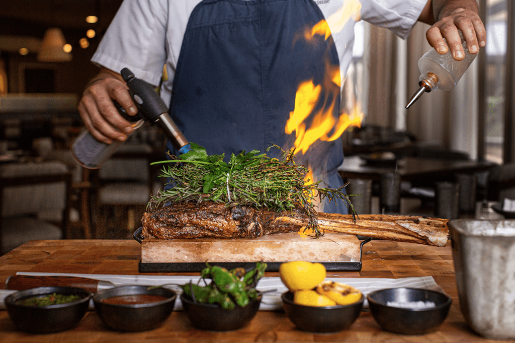 Guests at the Toro Toro opening party at Four Seasons Hotel Houston were treated to samples of the famed 52-ounce bone-in ribeye. (Photo by Jenn Duncan)