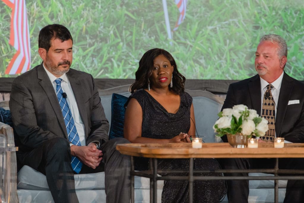 The poignant faces of surviving family members Paul Castro, Theresa Seck, Chuck Cook (Photo by CatchlightGroup.com)