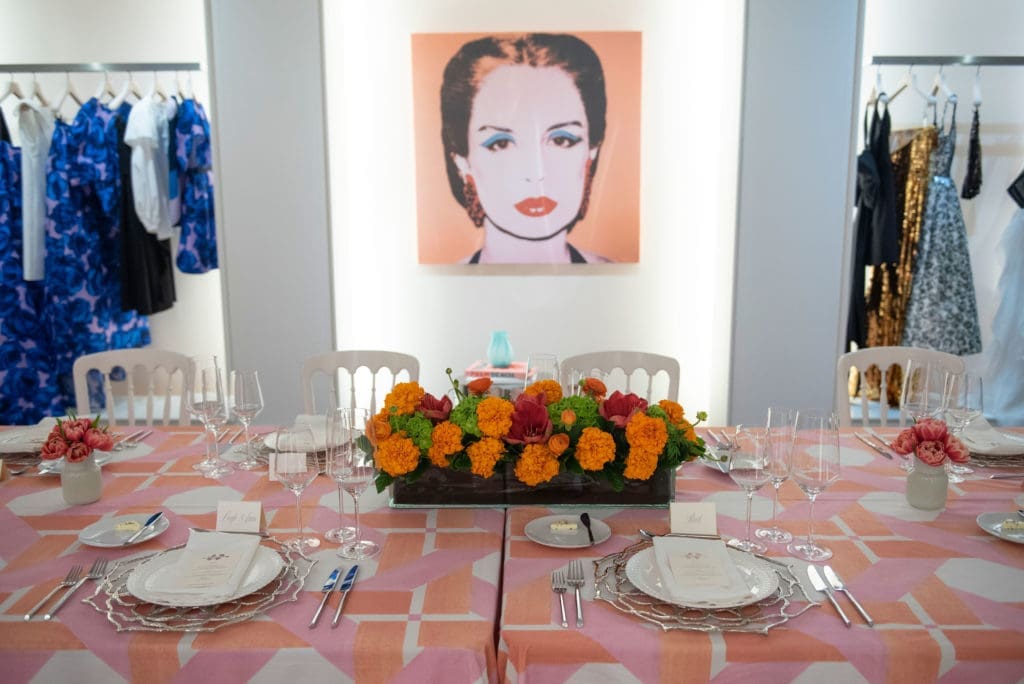 Though Miss Herrera wasn't in attendance herself, she looked over the elegant tablescape all night (Photo by Tamytha Cameron)