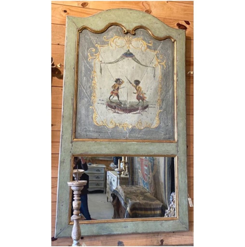 Rottet spotted this objet d'art: "Who can resist an 18th century French mirror with dueling mice!!"
