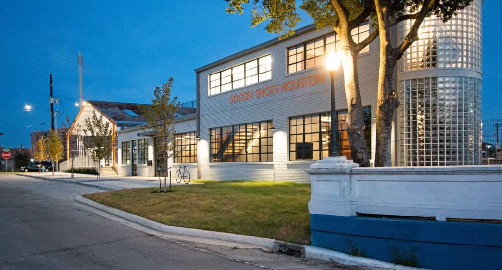 Alex Woods/Soccer Shots Houston receives a Preservation Houston Good Brick Award for repurposing the Gribble Stamp & Stencil Co. Building (1948) into an indoor space for a children's soccer program. (Photo by Keith Gendel)