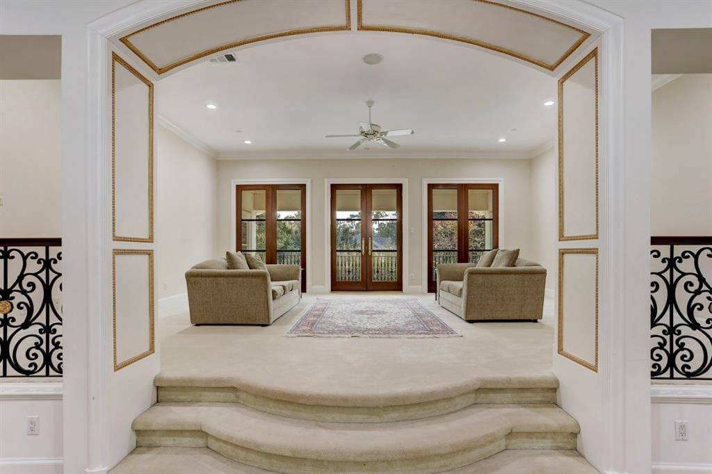 The second floor family room opens to the two story grand entry hall as well as the backyard terrace at 6 Pine Tree Lane. (Photo by TK Images)